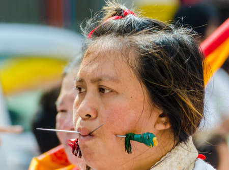 Phuket Vegetarian Festival  Shocking asian tradition - body piercing 