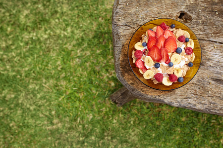 Healthy breakfast on wooden table, upper view with space from leftの写真素材