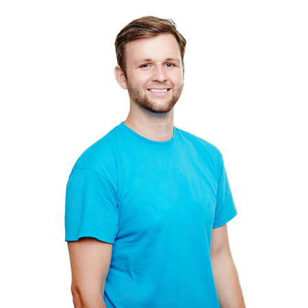 Portrait of a smiling man in blue t-shirt in a studio over a white backgroundの写真素材
