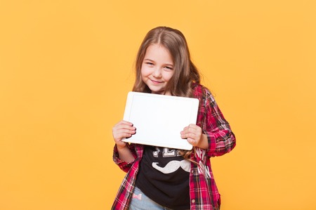 Stylish Cute Child with tablet computerの写真素材
