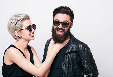 Angry young woman choking her boyfriendの写真素材