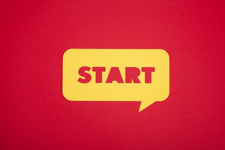 The cardboard sign with start textの写真素材