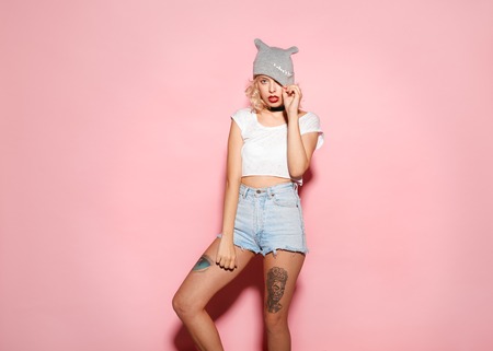 Woman holding her headingの写真素材