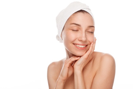 Happy woman enjoying her skinの写真素材