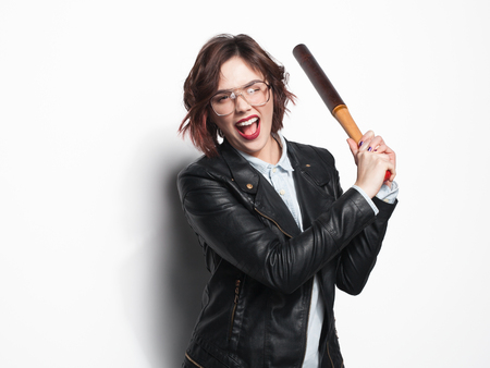 Aggressive female with batt posingの写真素材