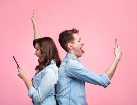 Cheerful couple taking selfie