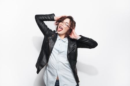 Trendy female making facesの写真素材