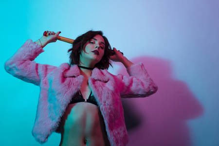 Stylish model with battの写真素材