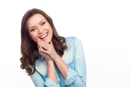 Lovely young woman on white backgroundの写真素材