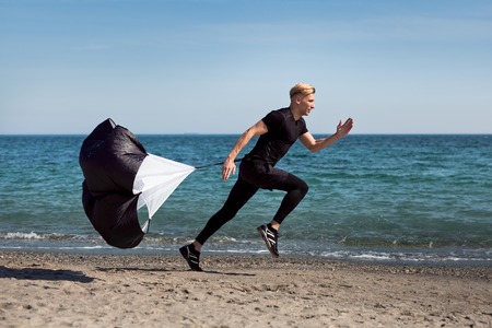 Man working out with parachute