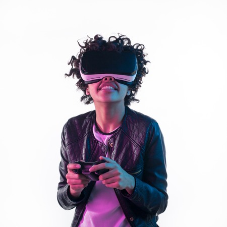 Woman with VR headset and gamepad