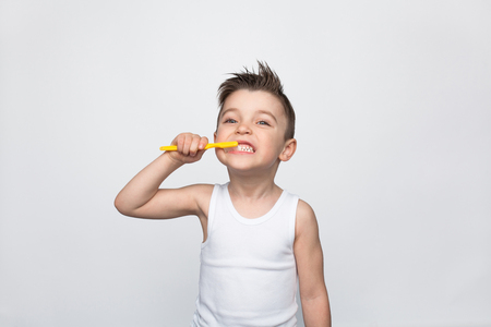 Little boy brushing teethの写真素材