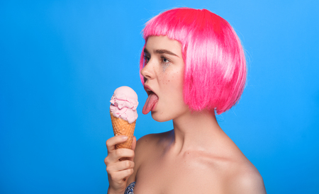 Vogue model licking ice creamの写真素材