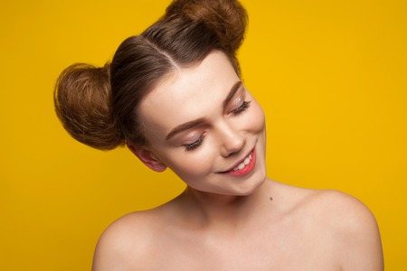 Brunette young woman with eyes closedの写真素材