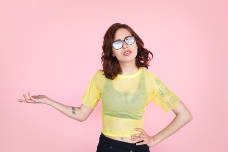 Tattooed youngster on pinkの写真素材