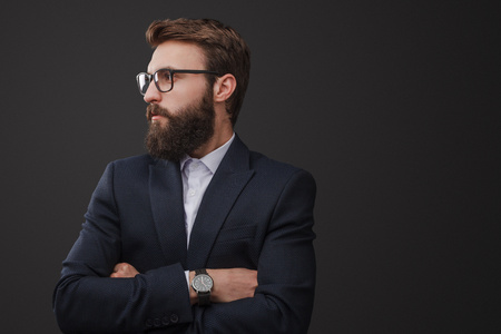 Elegant man in formal suit and eyeglassesの写真素材