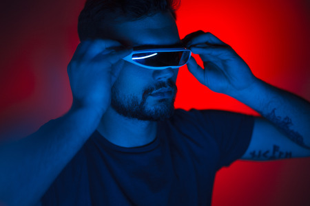Casual man in futuristic glasses
