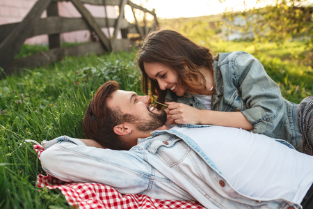 Young couple relaxing in countrysideの写真素材