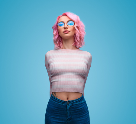 Sensual woman with pink hairの写真素材