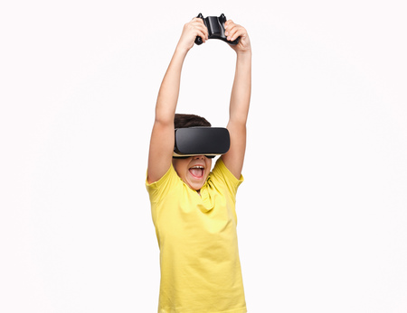 Boy in VR headset playing game