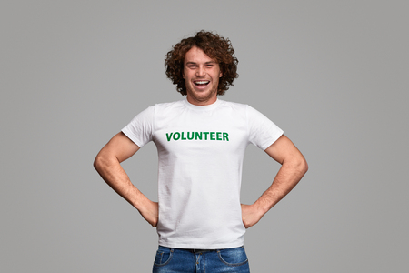 Confident volunteer in hero poseの写真素材