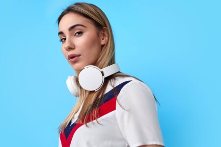Trendy young woman with headphones