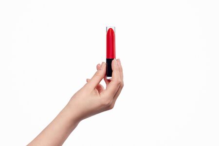 Crop hand with red lipstickの写真素材