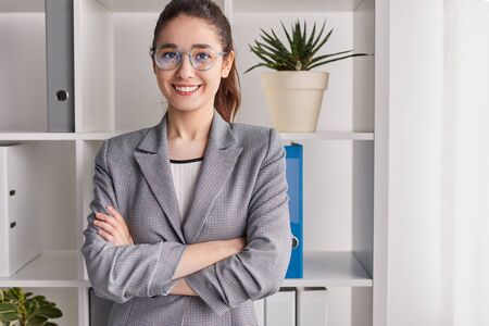 Confident young female in officeの写真素材