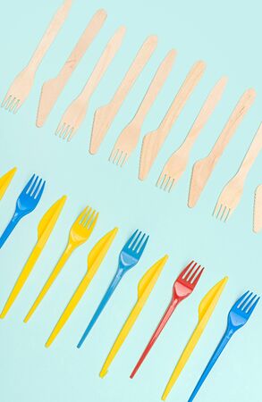 Rows of plastic and wooden cutleryの写真素材