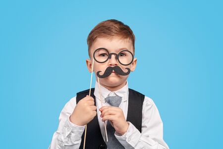 Little gentleman with mustache and glassesの写真素材
