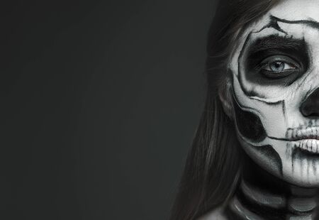 Scary woman with skeleton makeupの写真素材
