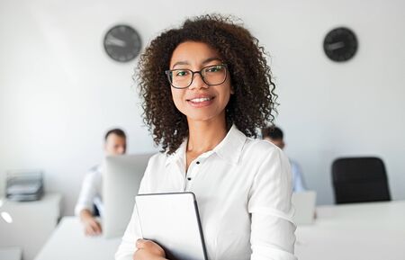Black business consultant smiling for camera