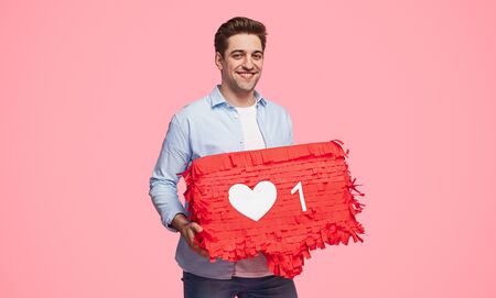 Cheerful guy representing social mediaの写真素材