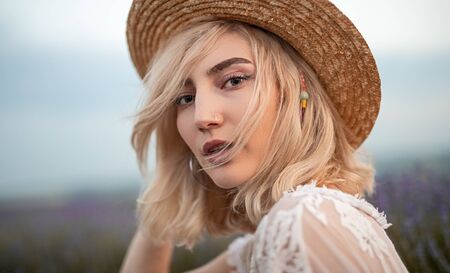 Trendy woman on windy summer dayの写真素材