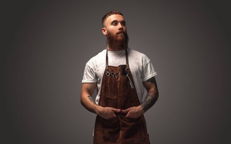 Confident barber looking at cameraの写真素材