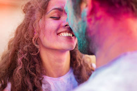 Happy couple during paint festivalの写真素材
