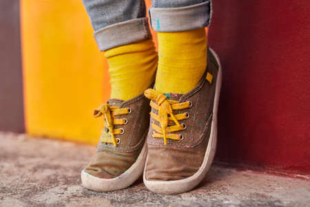 Crop woman in cloth shoes