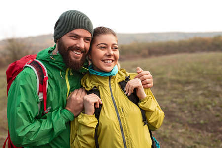 Happy couple of hikers enjoying natureの写真素材