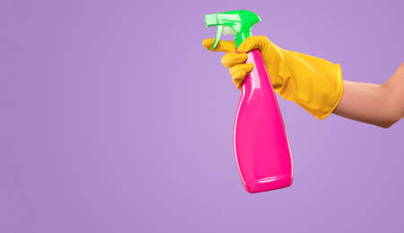 Crop housekeeper with bottle detergentの写真素材