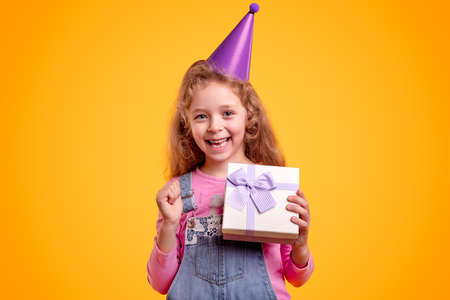 Happy girl with birthday presentの写真素材