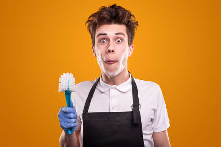 Funny man with toilet brushの写真素材