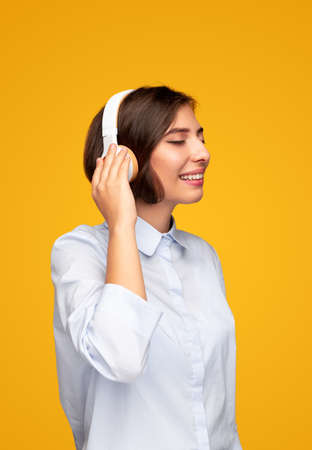 Glad woman listening to musicの写真素材