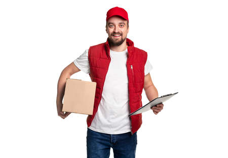Cheerful courier with clipboard delivering parcel