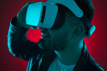 Bearded man in VR headset exploring virtual world