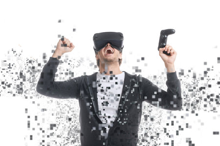 Gamer in VR glasses celebrating victory
