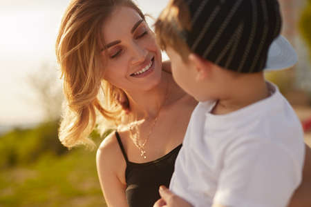 Mother and child in summer parkの写真素材