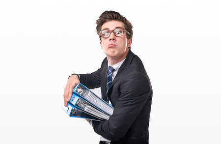 Funny accountant with folders in studioの写真素材