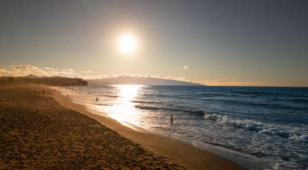 Scenic view of seashore in sunset