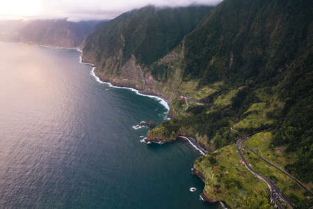 Landscape of cliff near sea on sunny dayの写真素材