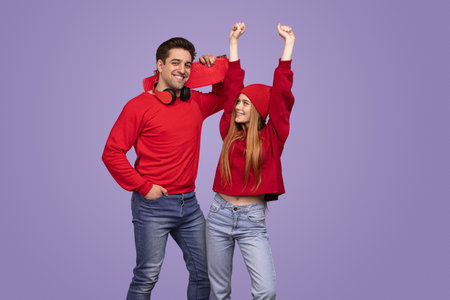 Stylish young couple with skateboardの写真素材